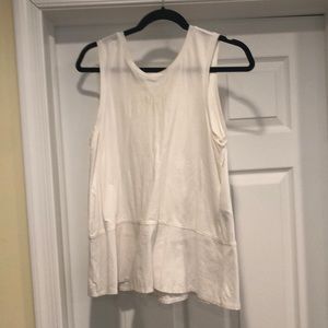 Woman’s gap design and crafted top white